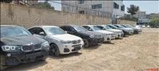 کشف ۱۴ خودروی BMW قاچاق در یک ساختمان مسکونی در غرب تهران